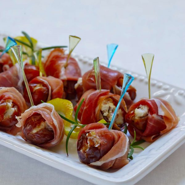 Dates stuffed cheese and wrapped bacon